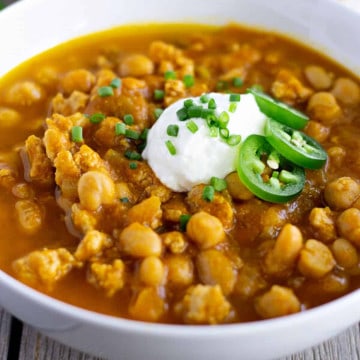 Feature image of turkey chili in a white bowl.