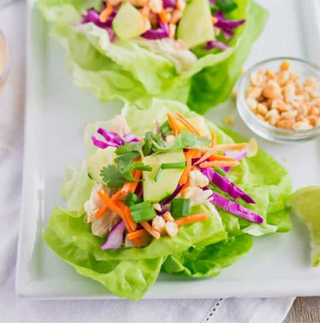Feature image of Thai Chicken lettuce wraps on a plate.
