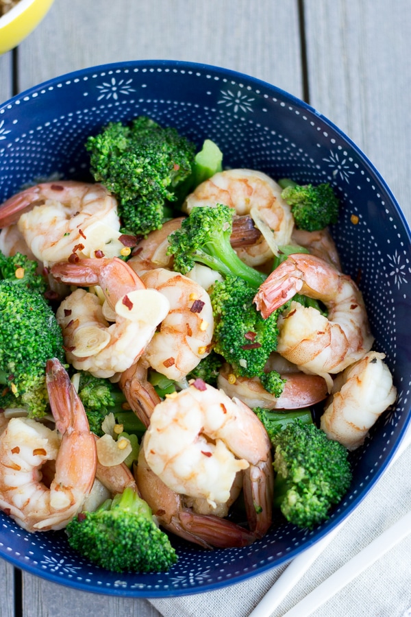 Shrimp and Broccoli in a blue bowl.