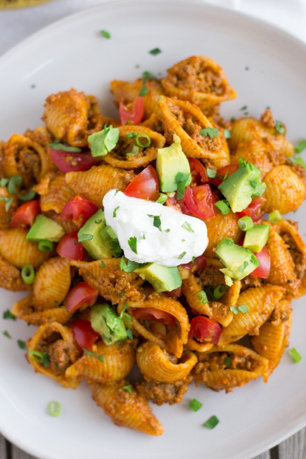 Overhead view of taco pasta on a white plate.