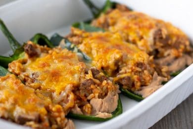 Stuffed Poblanos in a white baking dish