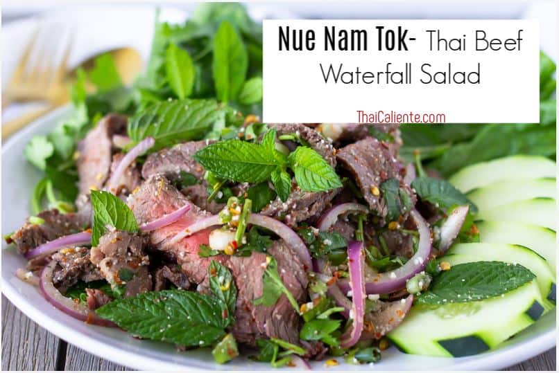 Text on image of beef salad saying, 'Nue Nam Tok- Thai Beef Waterfall Salad'.