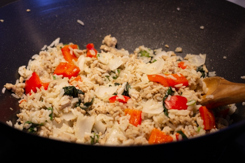 Cooking Fried rice in a wok