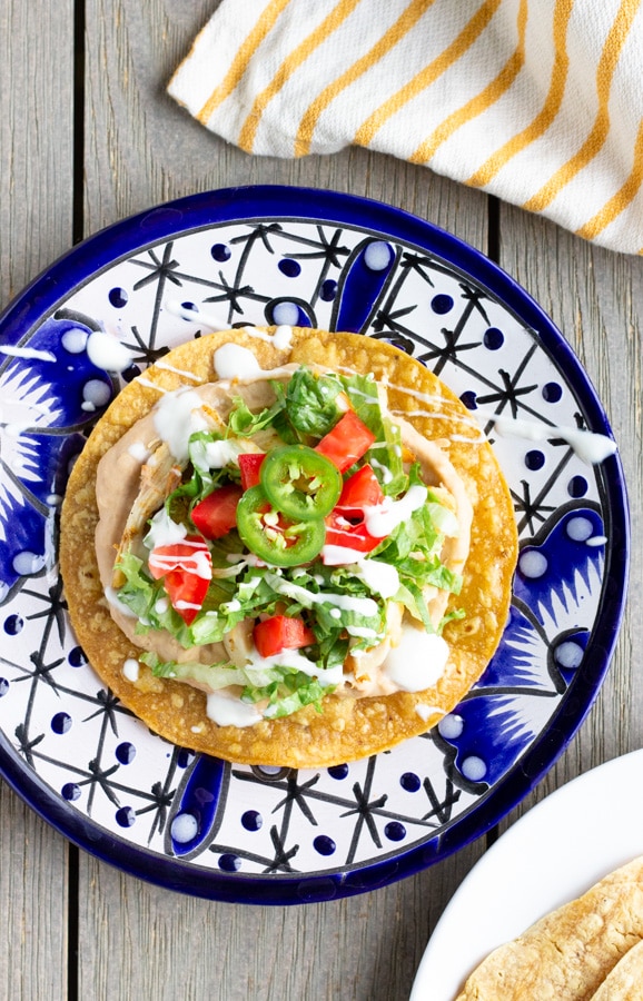 Overhead view of Tostada with a yellow napkin on the side