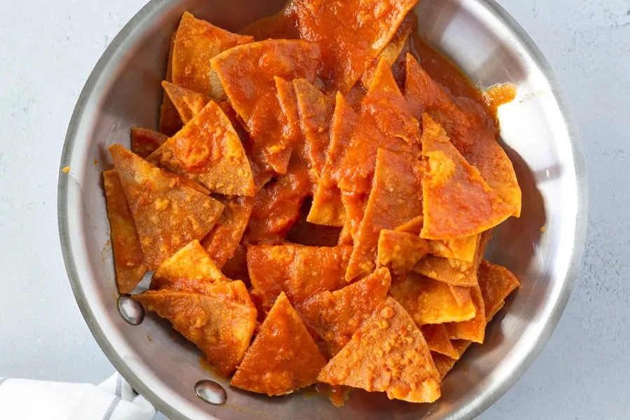 Chilaquiles Rojos in a skillet.