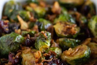 Roasted Brussel Sprouts in a white serving dish