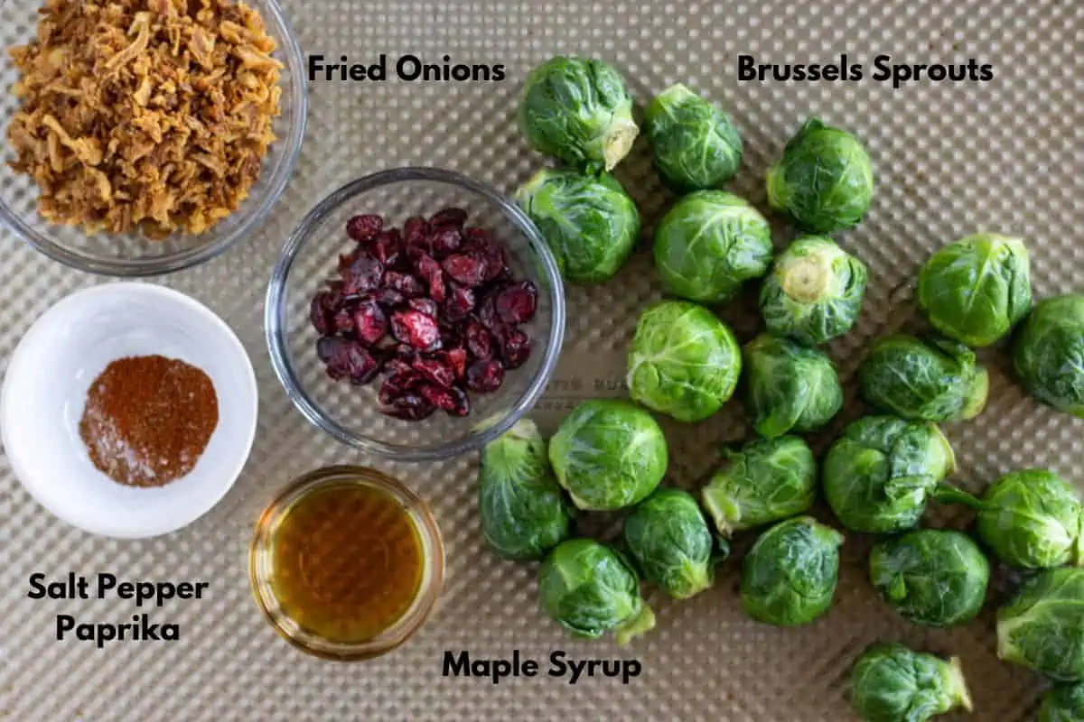 Ingredients on a baking sheet with text labels.