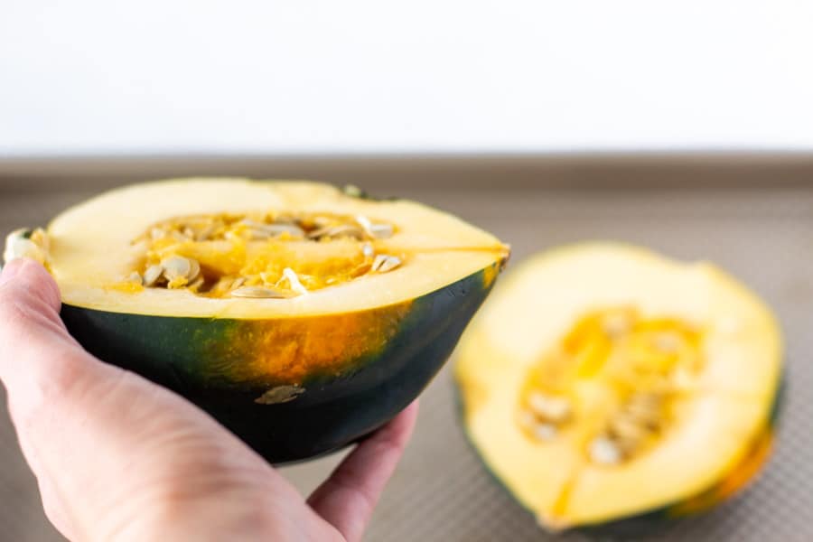 Acorn squash cut in half.