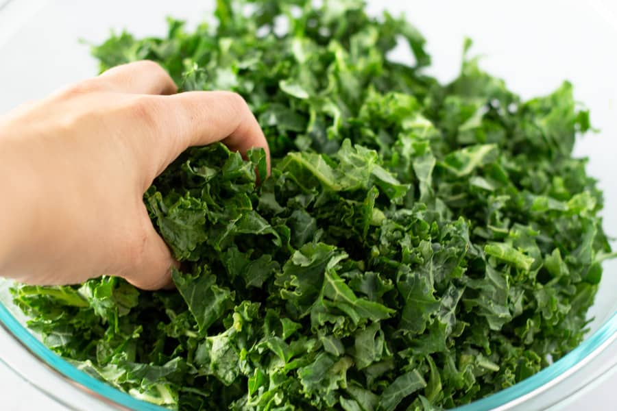 Massaging kale leaves