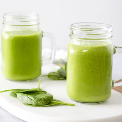 Landscape view of 2 green smoothies