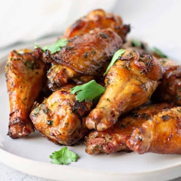 Grilled wings on a plate.