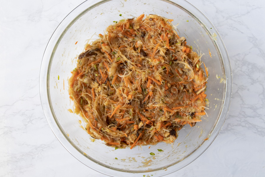 Filling mixture combined in a glass bowl.