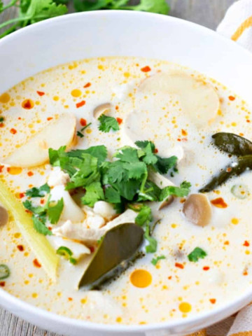 Feature image of coconut milk soup in a bowl.