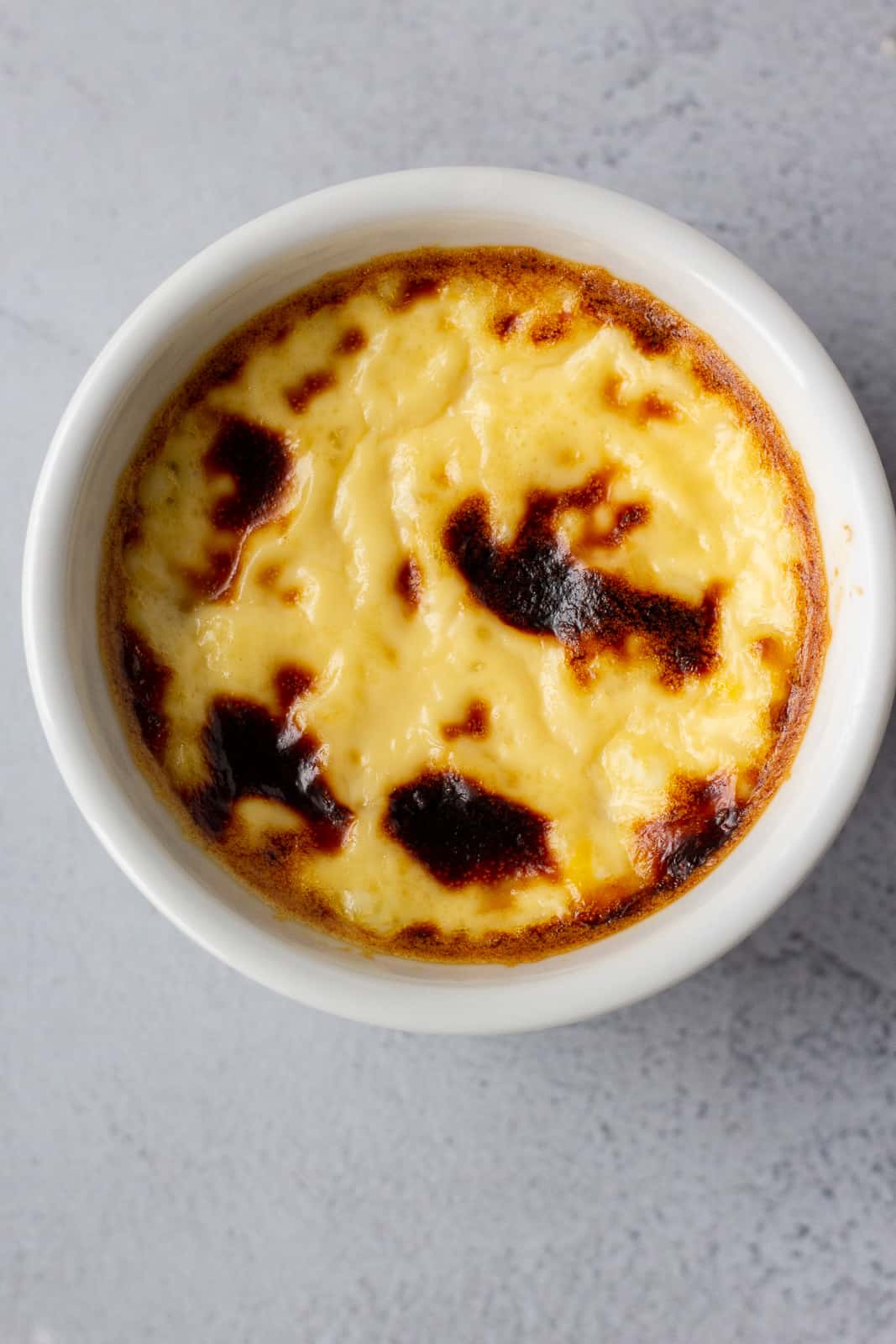 Overhead view of a single jericalla in a white ramekin