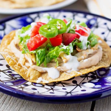 Feature image of chicken tostadas on a plate.