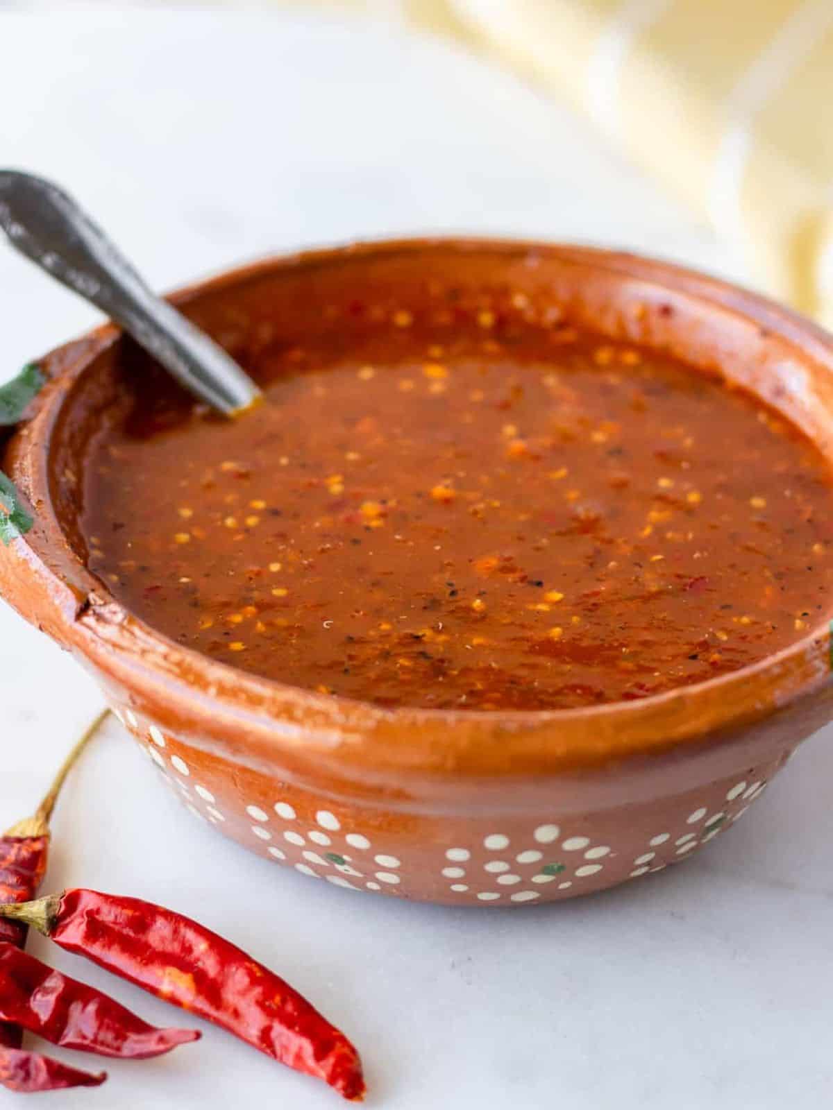 Spicy Mexican Salsa made with roasted chile de arbol and tomatillos. This salsa is perfect on all your favorite Mexican dishes.