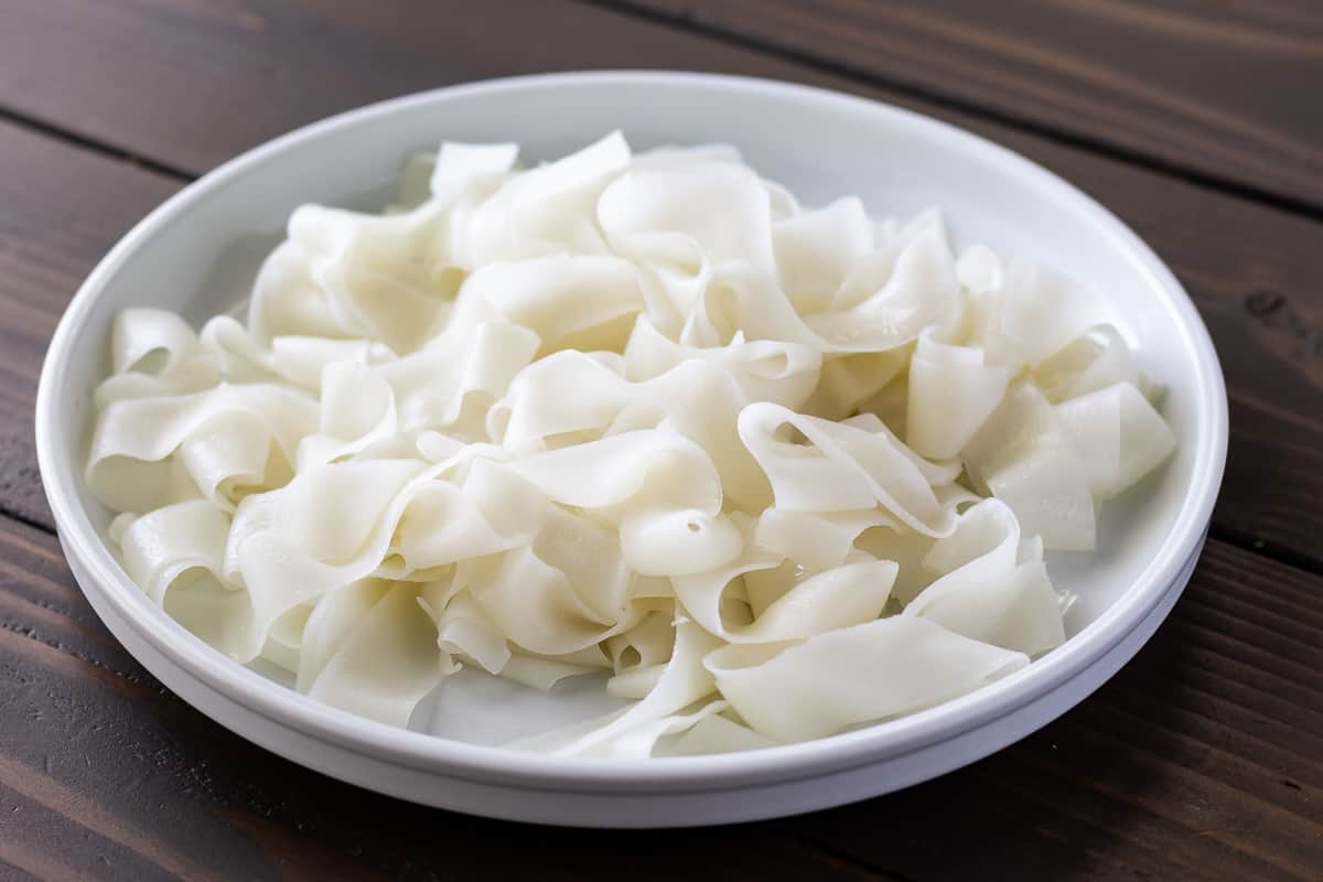 Rice noodles on a white plate.