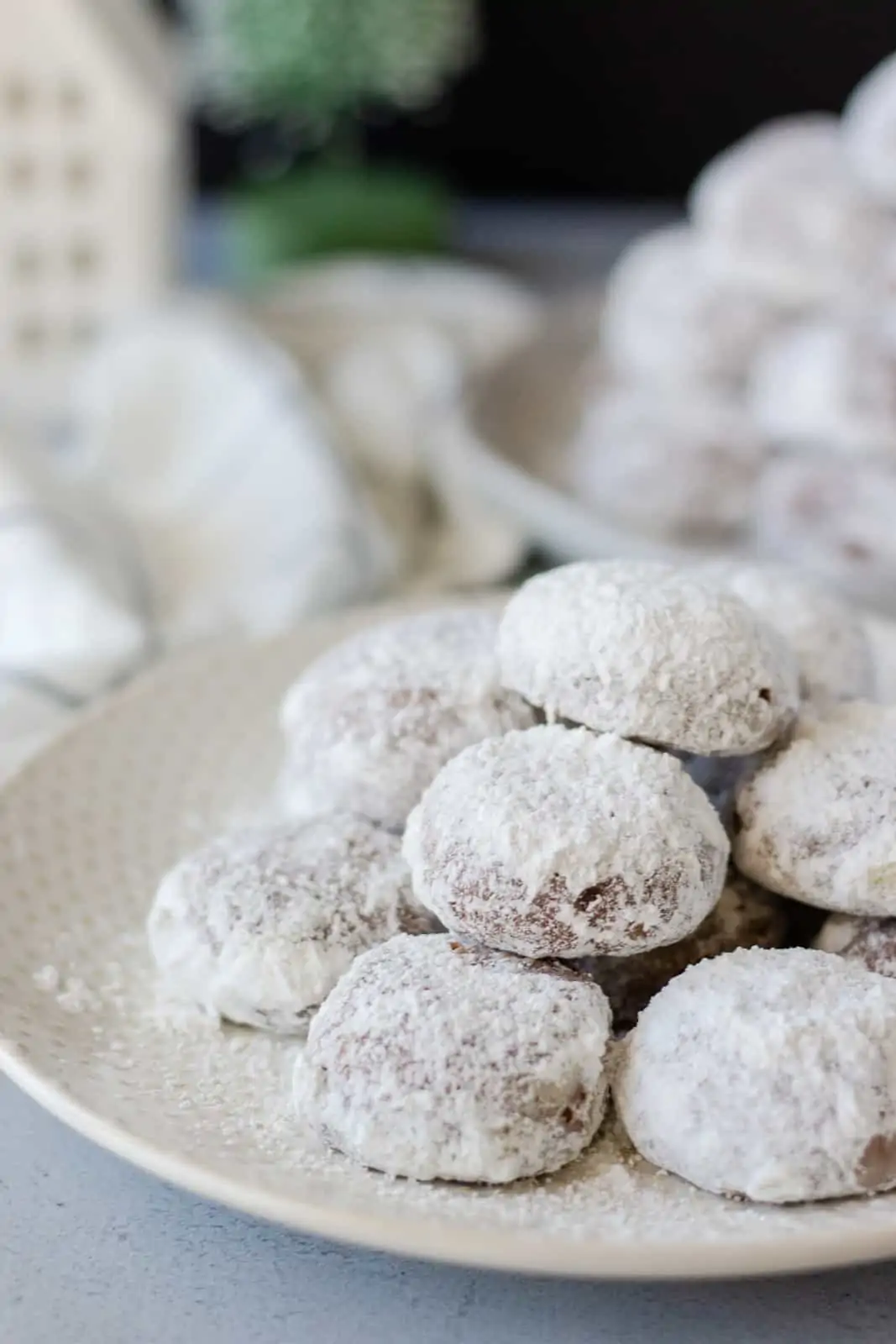 Cookies stacked on a round plate.