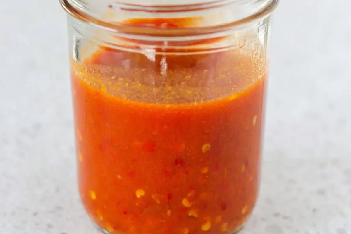 Salsa in a small mason jar.