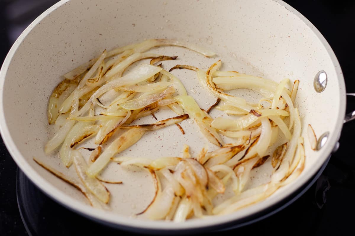 Caramelized onions in a skillet.