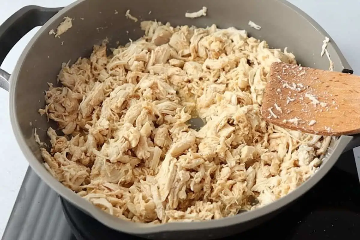Shredded Chicken in a skillet.