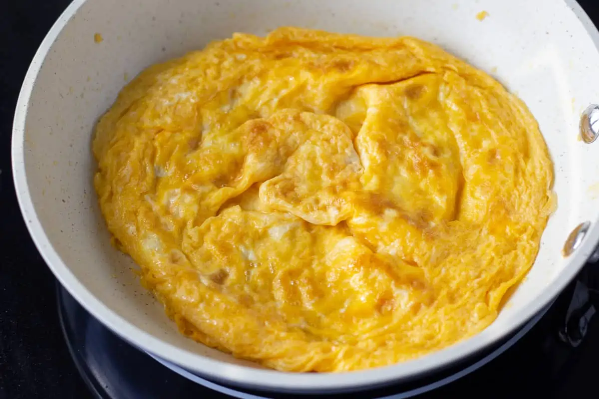 Thai omelet in a skillet