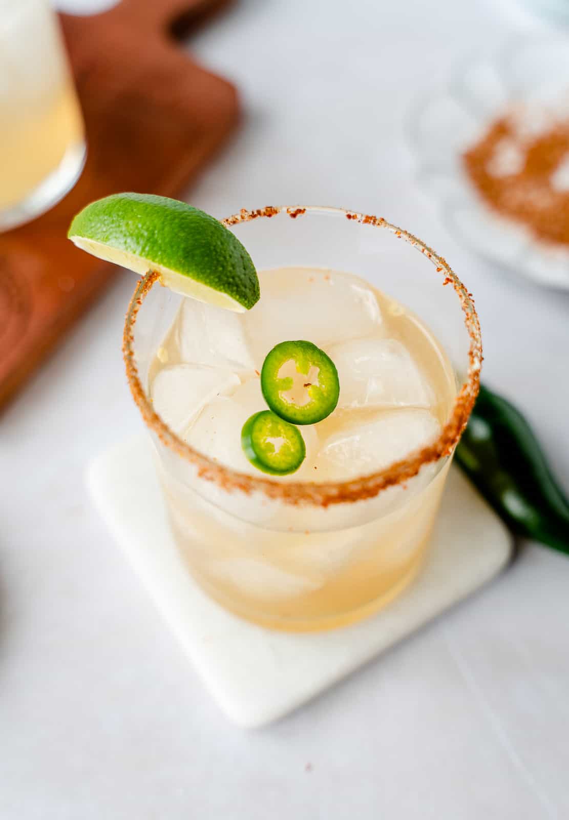 Overhead view of margarita rimmed with chile lime salt.