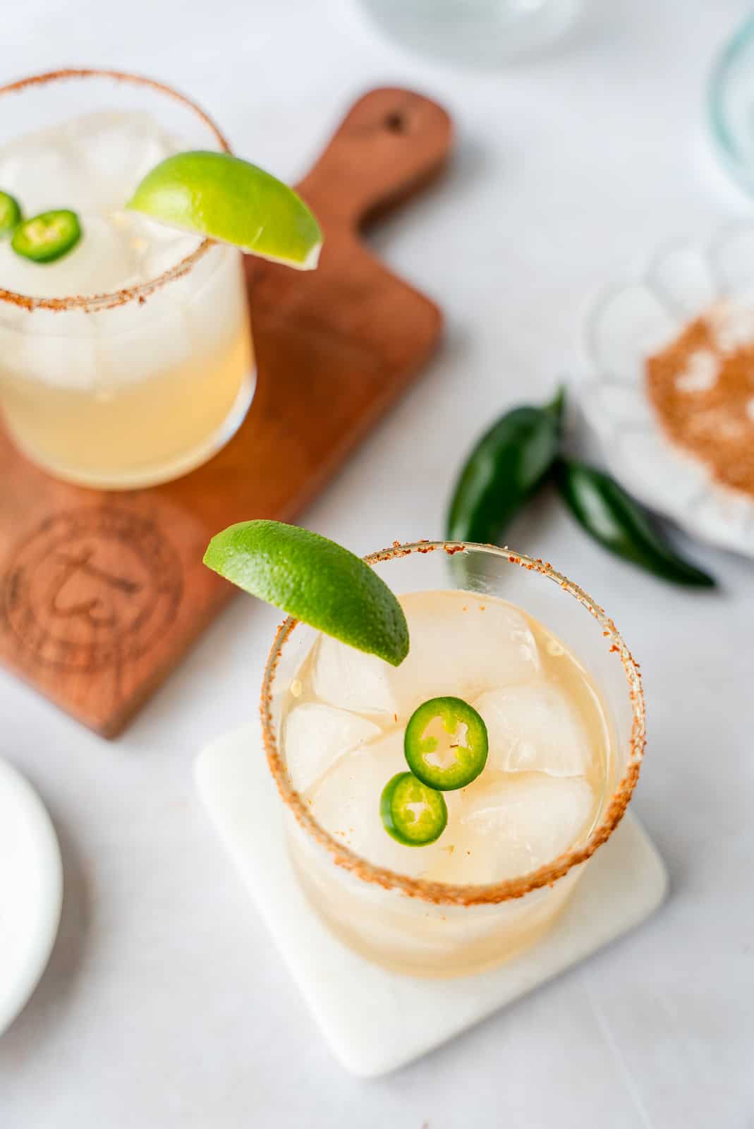 Overhead view of 2 skinny spicy margaritas.