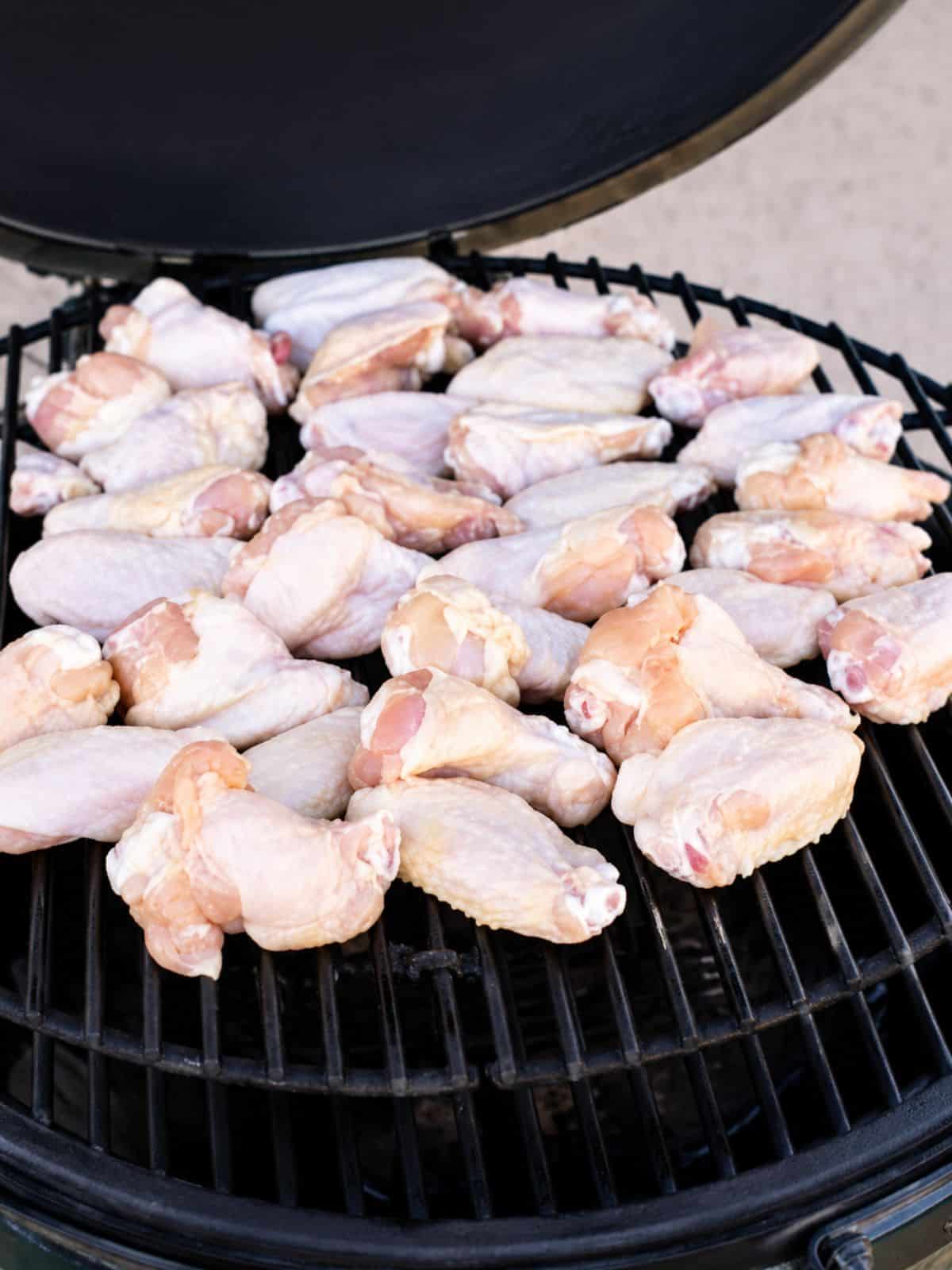 Close up shot of chicken wings on a griller.