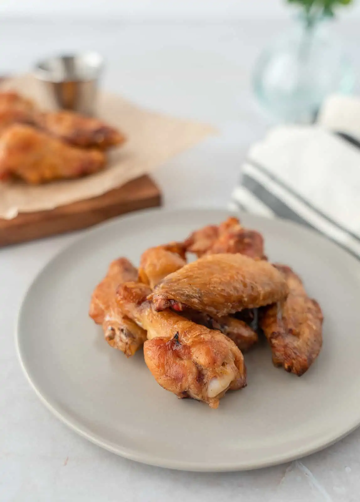 Naked cooked wings on a plate