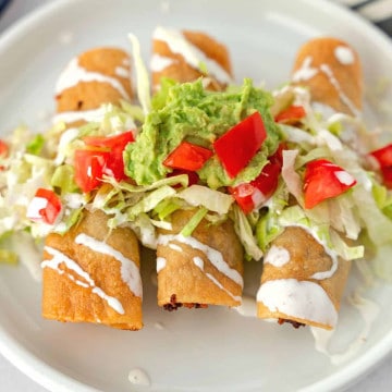 Feature describe of taquitos with toppings.