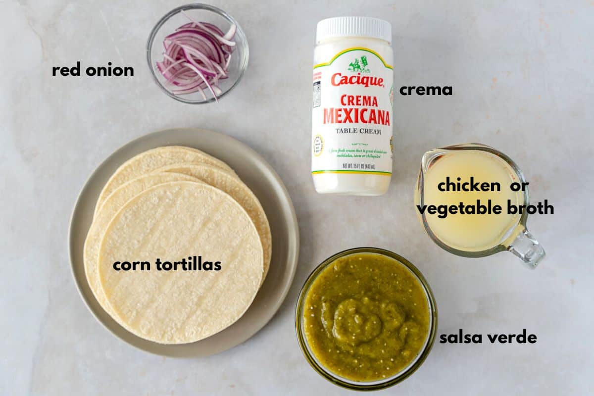 Ingredients with text, (Red onion, crema, corn tortillas, chicken broth, salsa verde).
