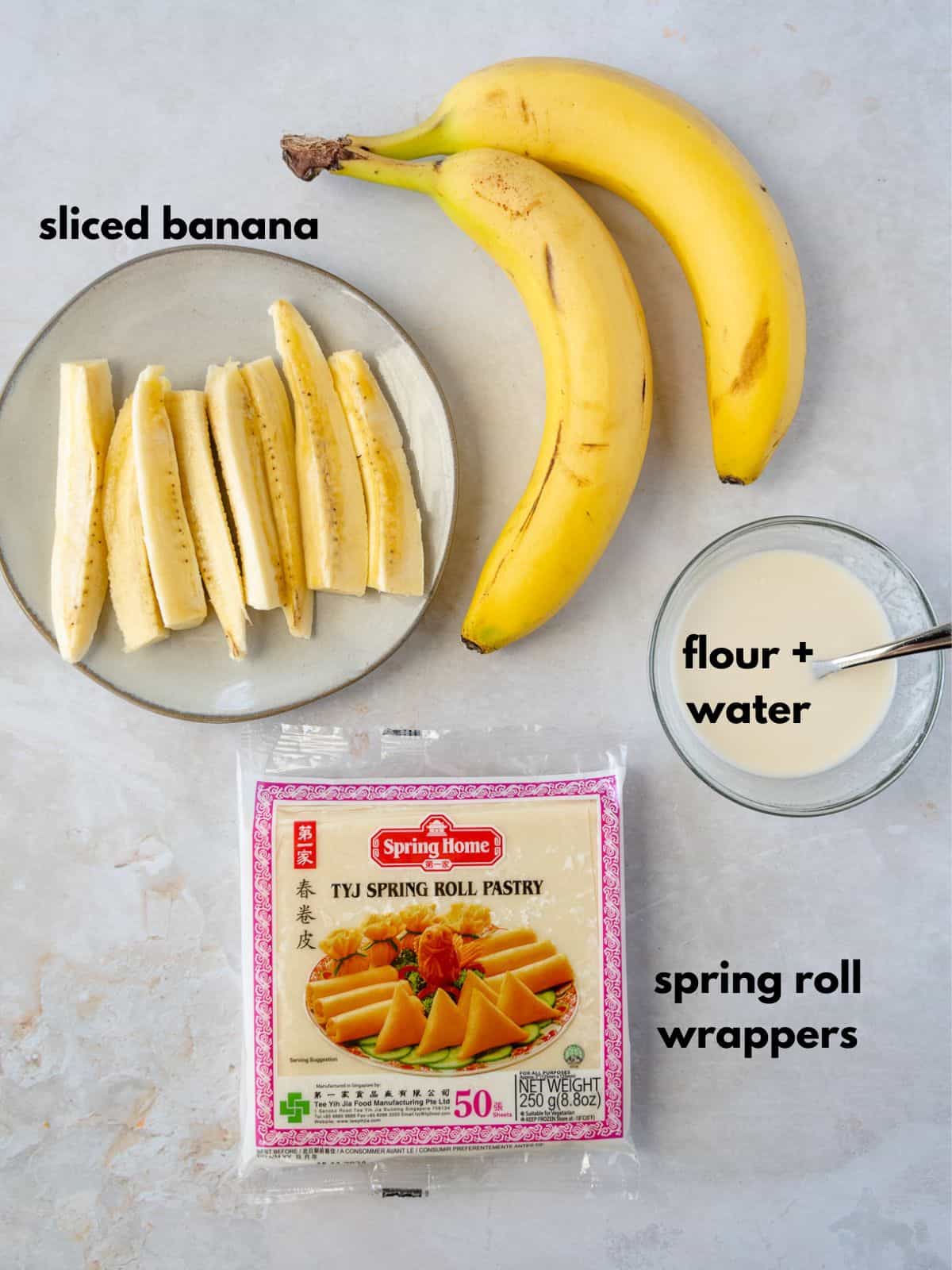 Ingredients with text, 'sliced banana, flour and water, spring roll wrappers.