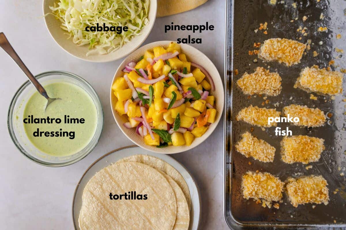 Ingredients labeled with text for assembling panko fish tacos.
