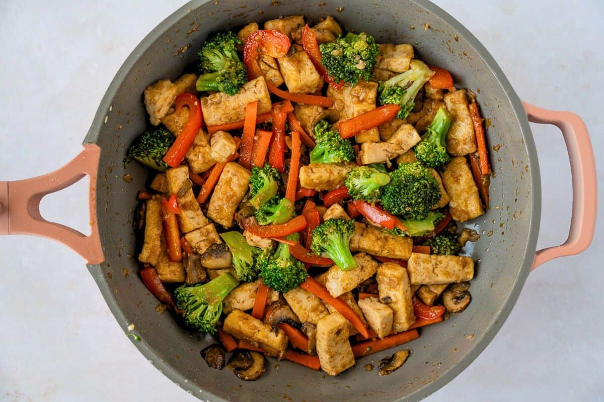Tofu and Vegetable stir fry in a skillet.