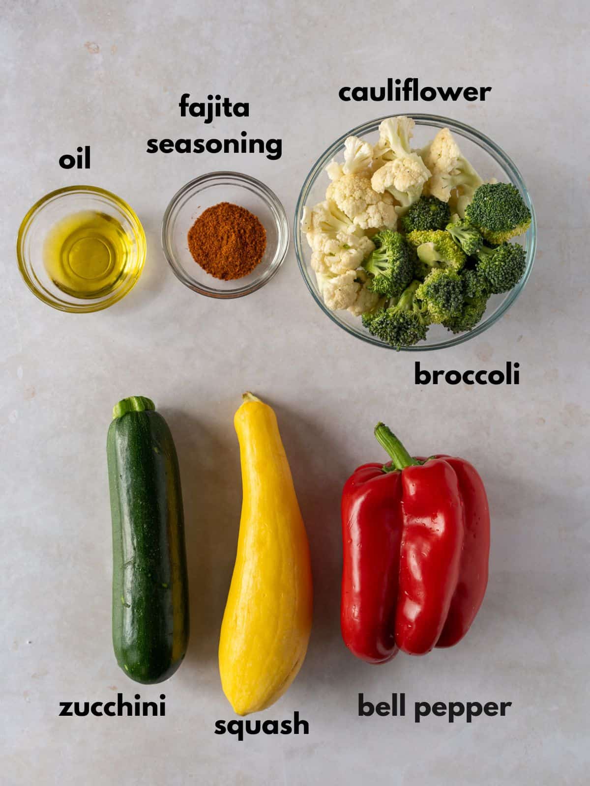 Whole raw vegetables, oil, and fajita seasoning.