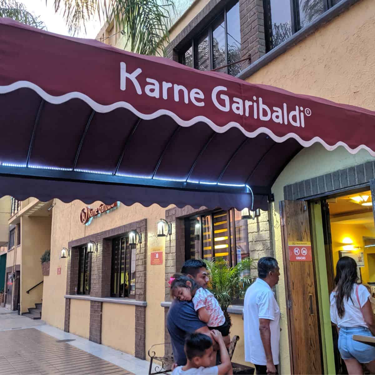 Sign in front of Karne Garibaldi in Guadalajara, MX.