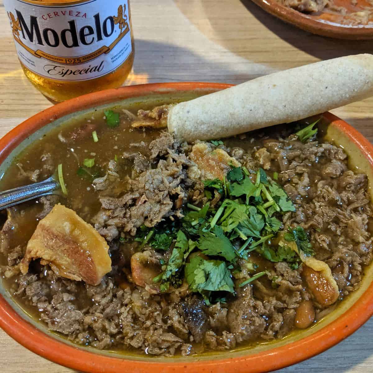 A bowl of carne en su jugo from Karne Garibaldi in Guadalajara.