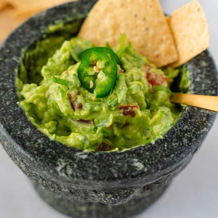 Feature image of molcajete guacamole.