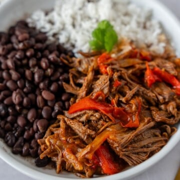 Feature image of Mexican Pot Roast with black beans and white rice.