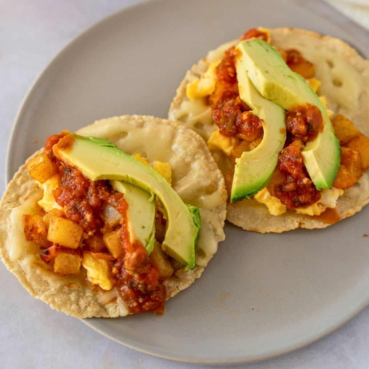 Feature image of potato, egg, and cheese breakfast tacos.