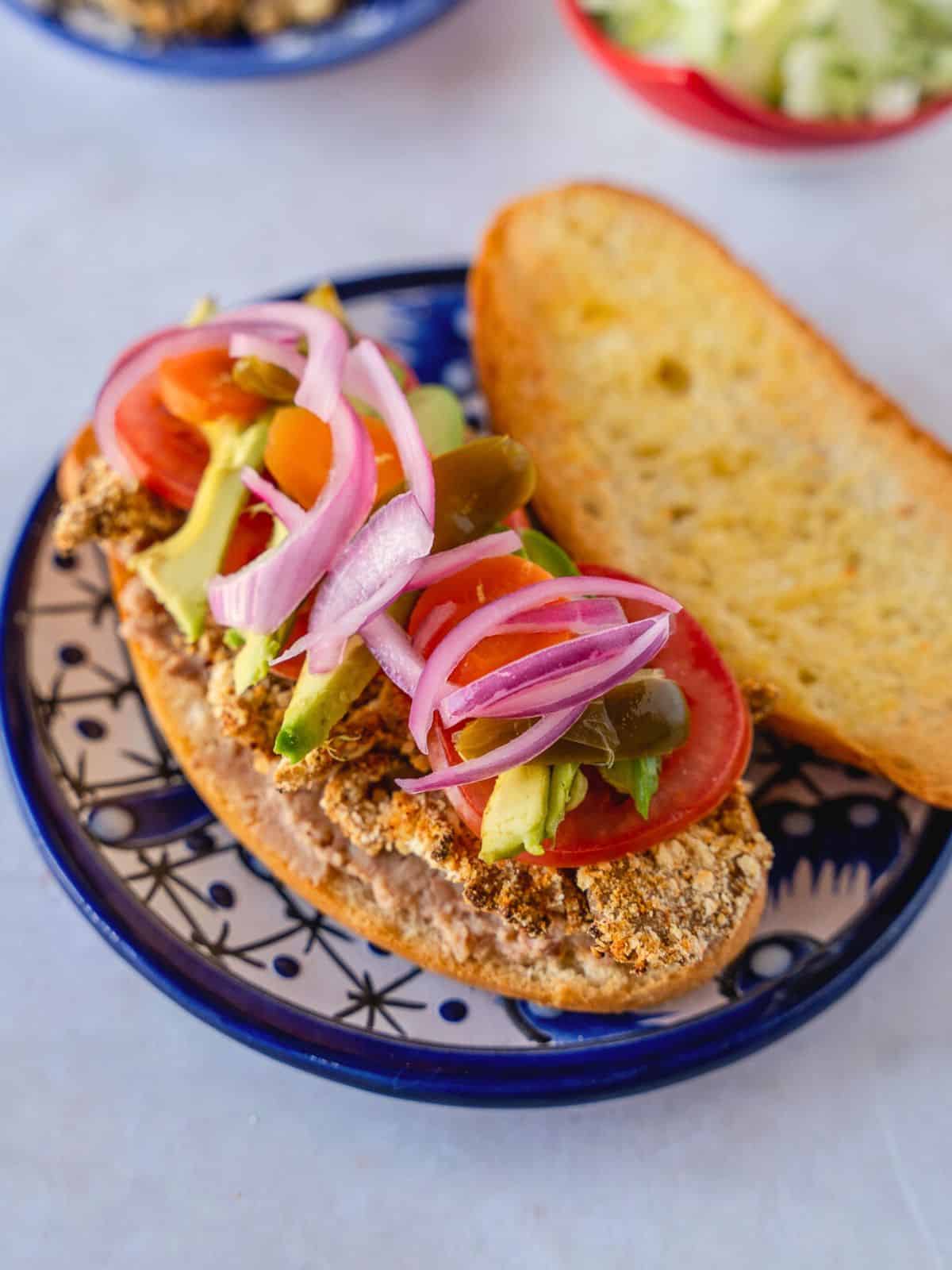 Open faced Mushroom milanesa torta.
