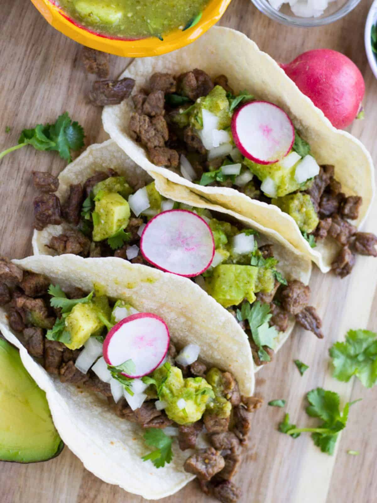 Overhead view of carne asada tacos.