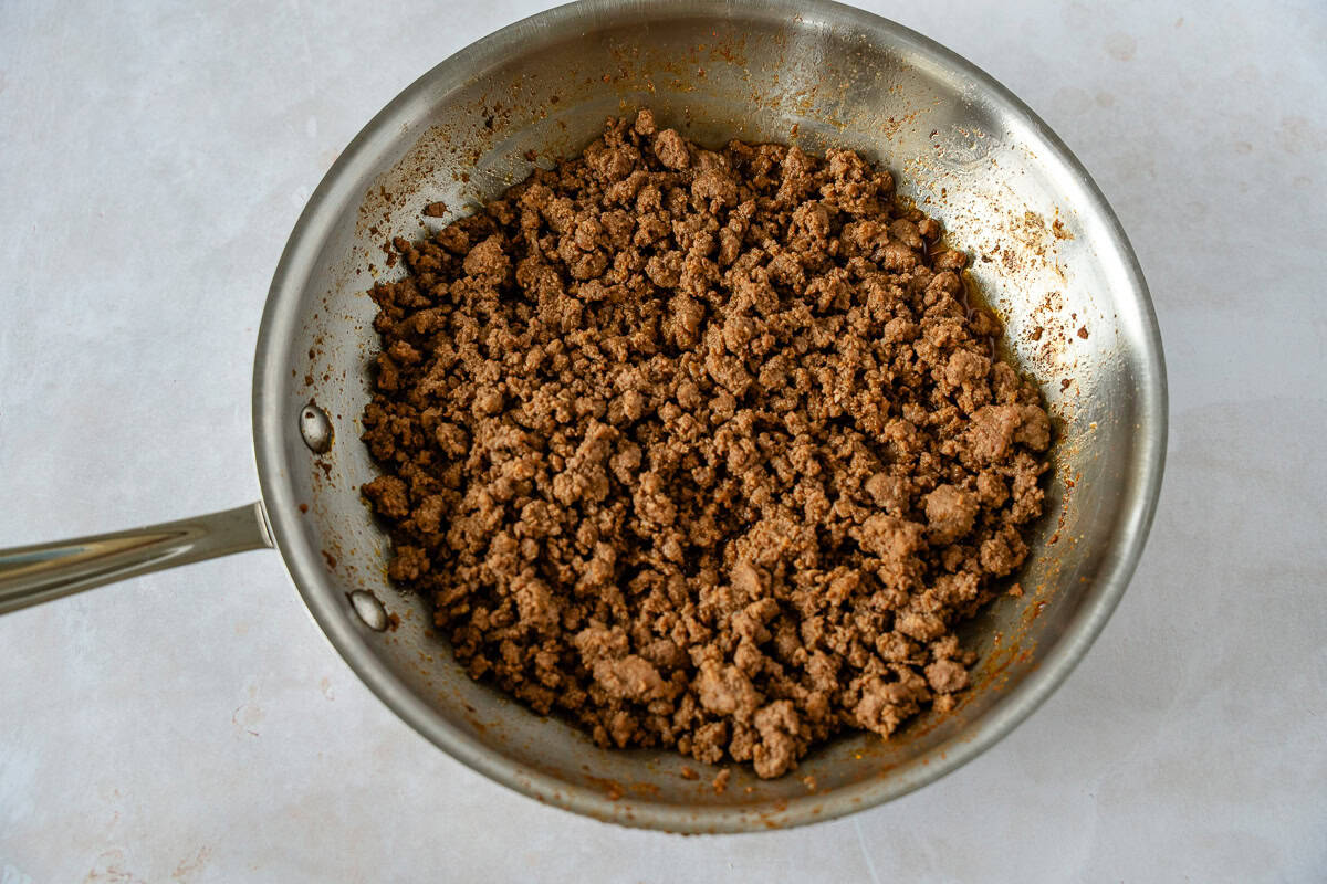 A pan filled with ground beef and spices.