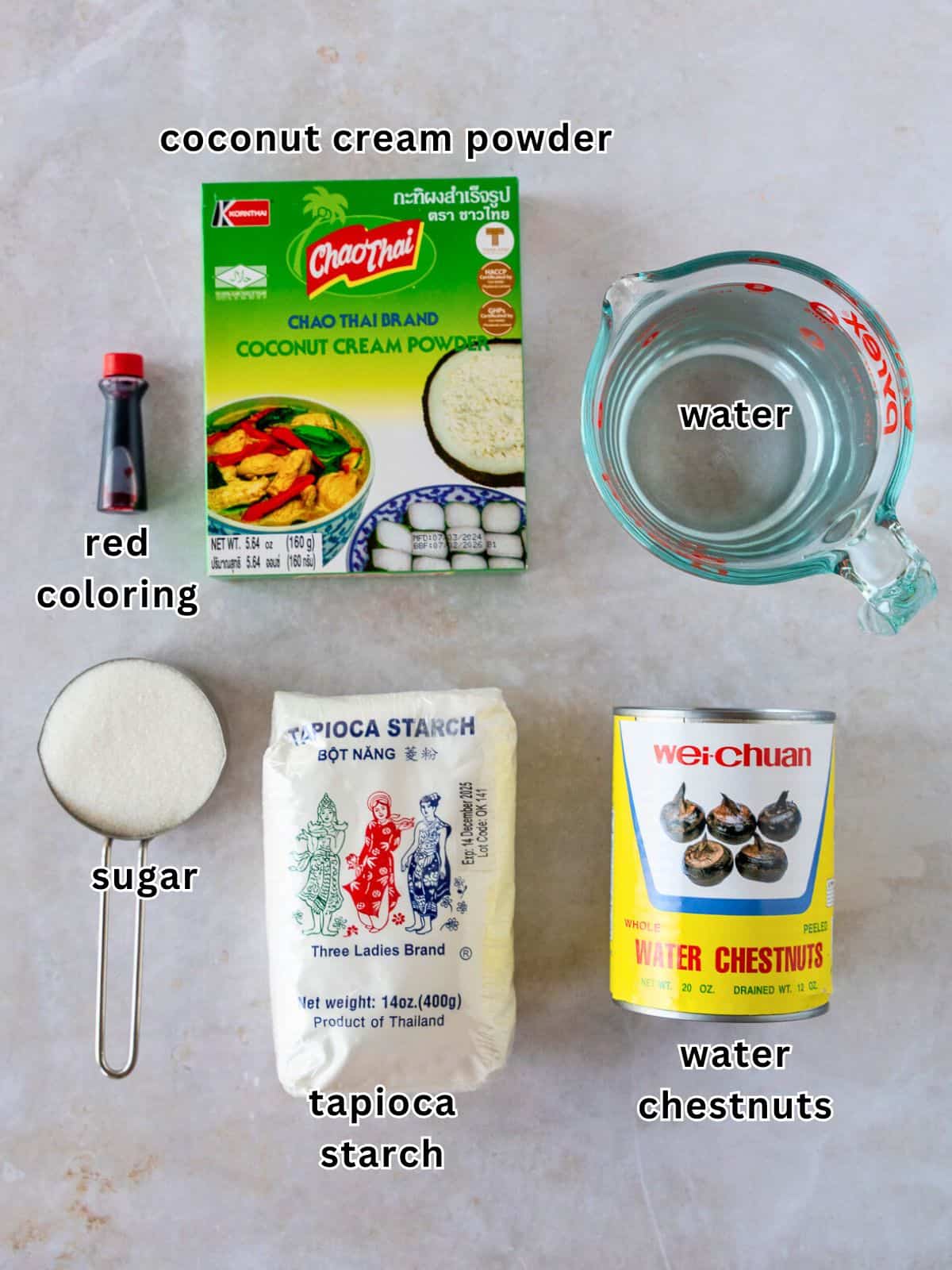 Ingredientes with text- coconut cream powder, red coloring, water, sugar, tapioca starch, water chestnuts.