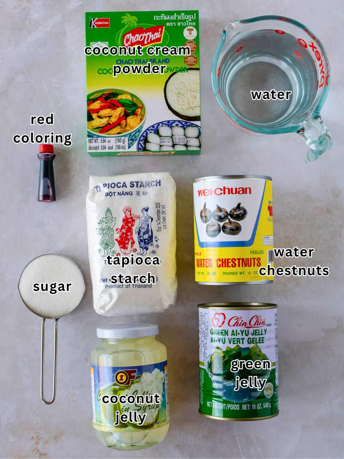 Ingredients with text- coconut cream powder, red coloring, water, sugar, tapioca starch, water chestnuts, coconut jelly, and green jelly.