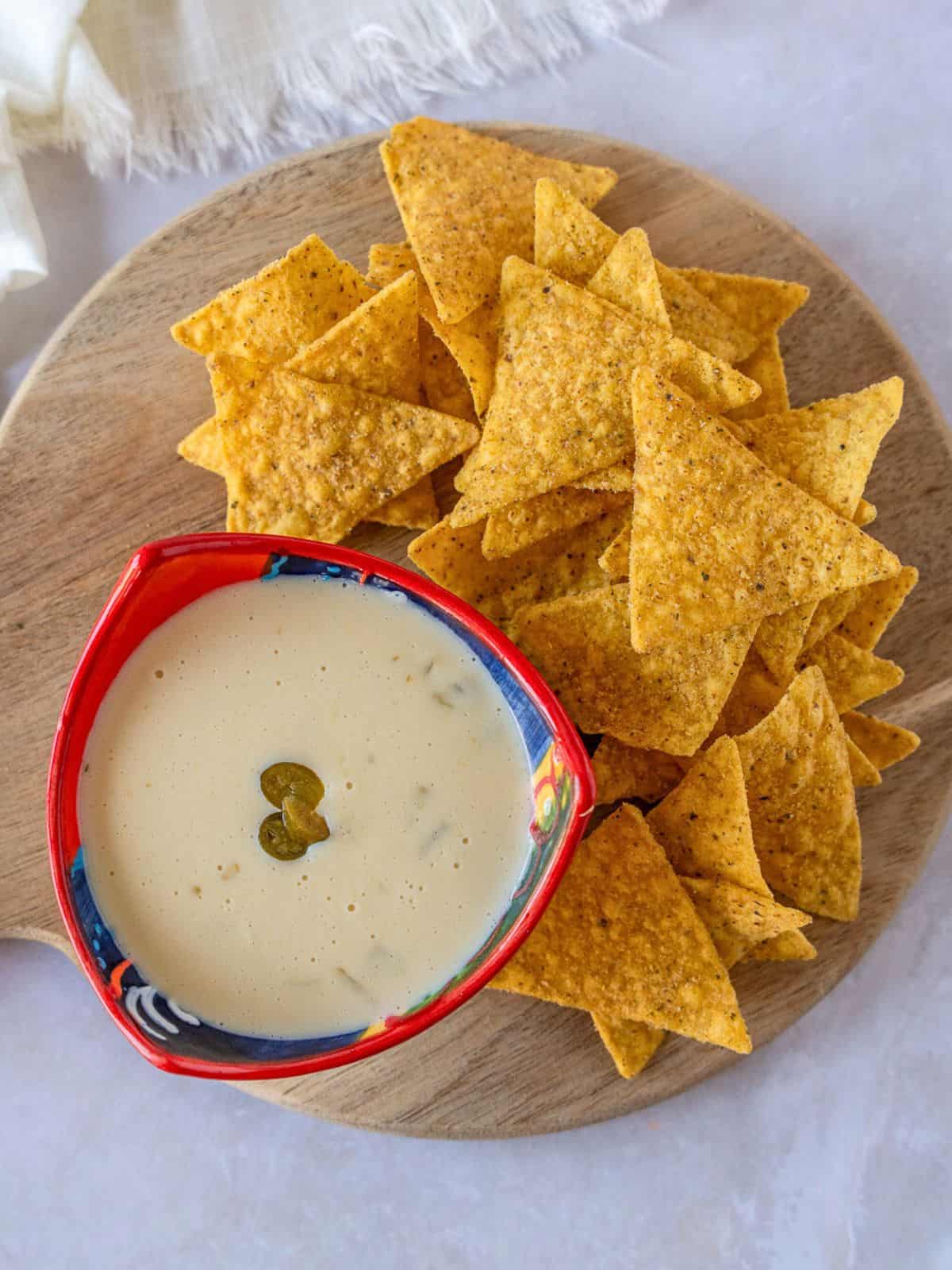 Overhead view of queso blanco with tortilla chips.