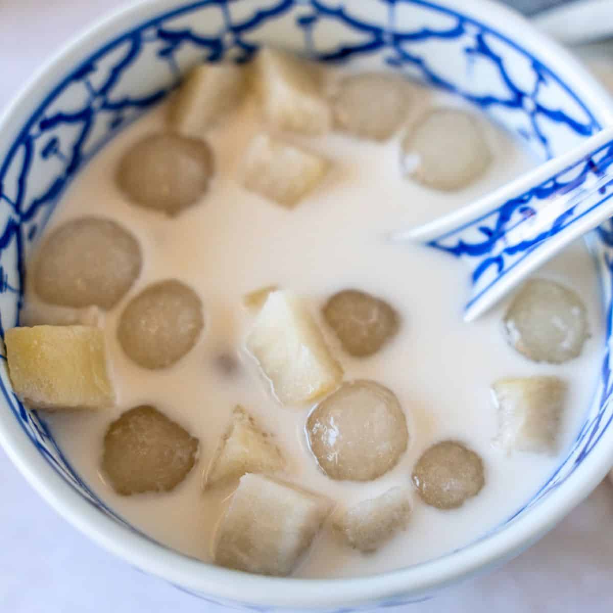 Feature image of bua loy dessert in a blue bowl.