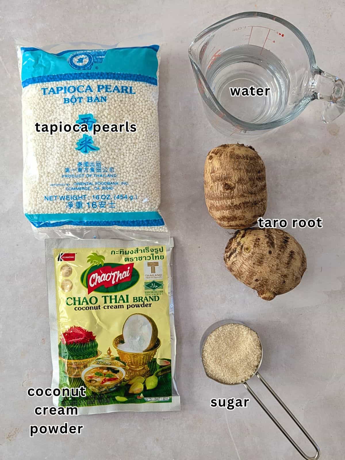 Ingredient with text, tapioca pearls, water, taro root, coconut cream powder, sugar.