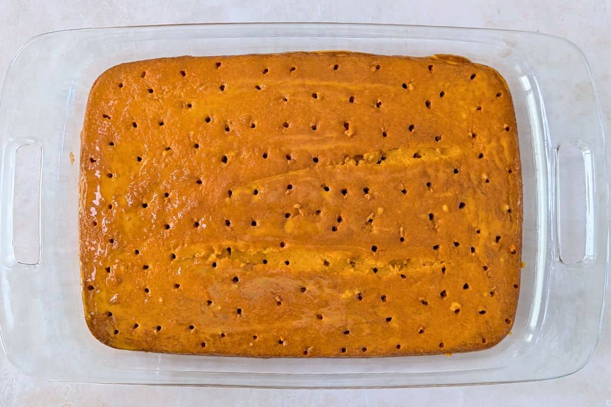 Holes poked on Thai team cake.